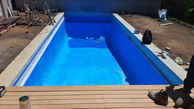 Fibreglass lining against a timber deck